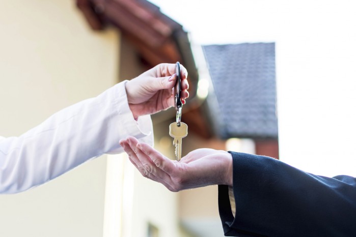 Handing over keys to a home